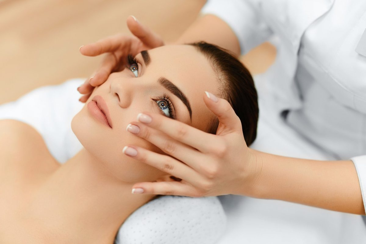 Client relaxing during a facial