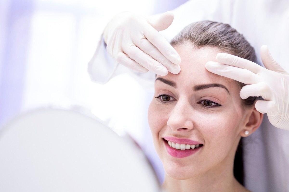 Smiling client during a skin treatment